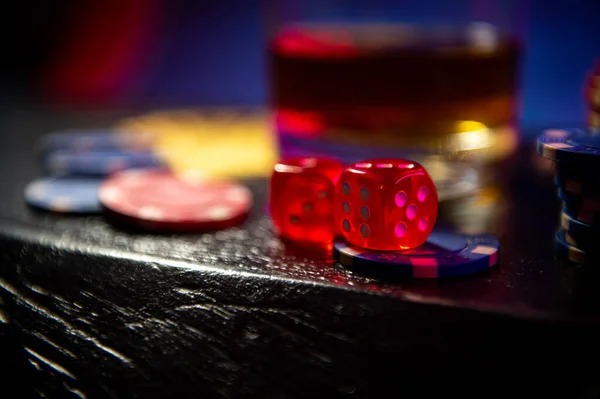 Live dealer holding Texas Hold'em Bonus cards at momoslots studio